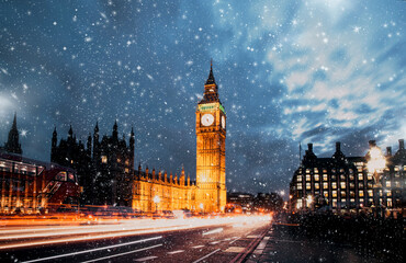 snowfall over Big Ben  winter in London
