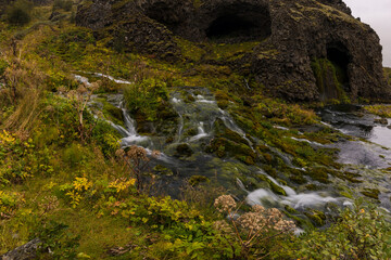 Europe, Iceland. View of Gjain waterfalls in a tranquil and scenic valley of the southern highlands.
