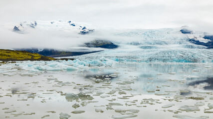 Europe, Iceland. View of Fjallsarlon Glacier lagoon shrouded in fog.