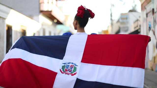 dominican girl with dominican flag and typical clothes