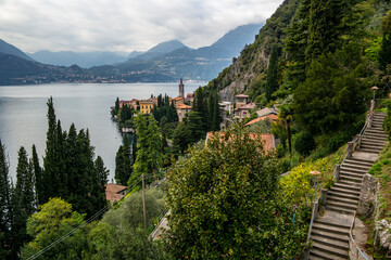 Fototapeta na wymiar Overview on Lake Como from Varenna in cloudy weather, Lombardia - Italy