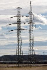 High-voltage power lines electricity transmission pylon  