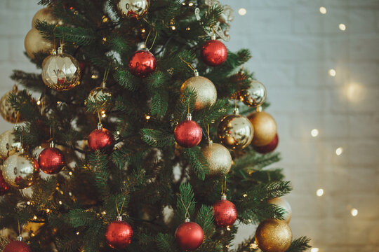 Christmas background. Christmas tree with toys and garlands.