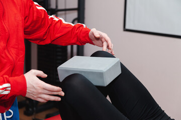 Physiotherapist working with athlete patient in clinic centre, therapy hands detail