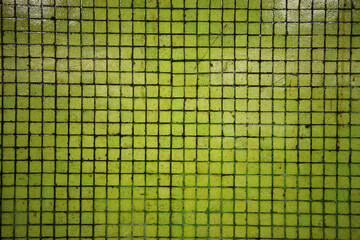 Green vintage tile texture background.