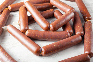 Closeup isolated image of strings of homemade sucuk or sausage stuffed in casing and made into...