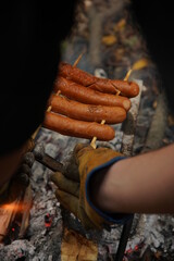 hot dog with a bottle in the woods