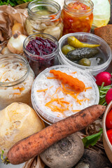 Homemade fermented in glass jars, pickled food healthy vegetables, fruit harvest. Winter fermented and canning superfood concept. Probiotics, enzymes, nutritiion veggy preservation. Selective focus