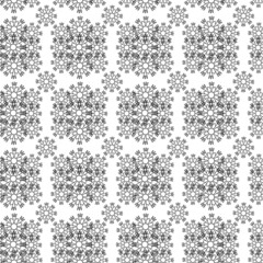 Seamless Pattern of Snowflakes in doodle style, white and black. Winter decor for Christmas and New Year. Design of textiles, wrapping paper, cards, banners. Vector linear illustration.