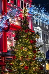 A beautiful decorated Christmas tree during night time in central London, Mayfair