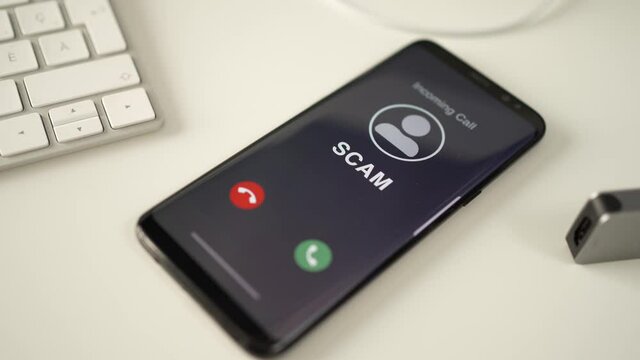 Mobile Phone Receiving Incoming Call Scam Alert and Then Declining