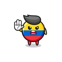 Fototapeta premium colombia flag character doing stop gesture