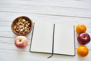 Naklejka na ściany i meble notepad on table measuring tape fruit breakfast nutritional fitness