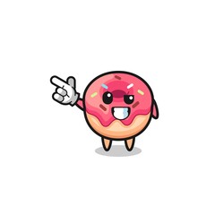 doughnut mascot pointing top left