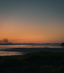 Obraz premium Sunset on destroyed river