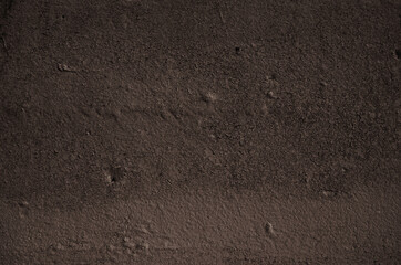Old weathered concrete with cracked paint. Grunge texture background.