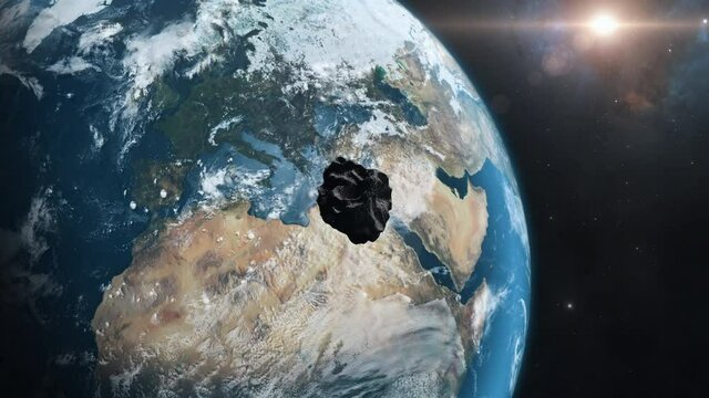 Look at globe from space with sun in background asteroids flying towards earth