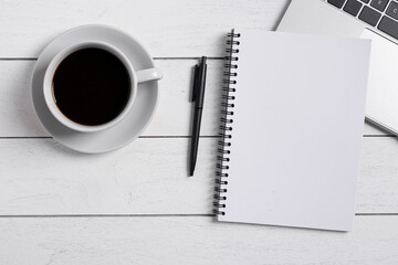 Fototapeta na wymiar coffee cup and notebook