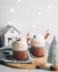 Still life. Celebration atmosphere. Beverages. Coffee with cream. Christmas. Light background.