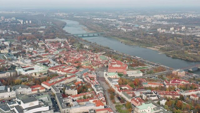 Aerial pullback, revealing Warsaw Cityscape with Visttula river, Poland
