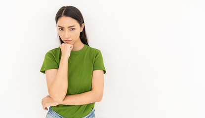 Portrait of angry pensive mad crazy stress angry asian woman in green t-shirt (expression, facial),...