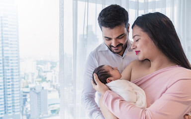 Portrait of Asian parents with newborn baby, Closeup portrait of asian young couple father mother...