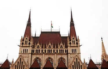 Fototapeta premium Budapest, Hungary - May 28, 2019: old church on the other side of the water