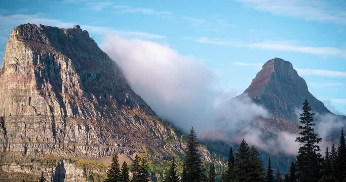 Time Lapse, Mountain Peaks and Clouds Formations at High Elevation on Sunny Summer Day. Glacier National Park, Montana USA