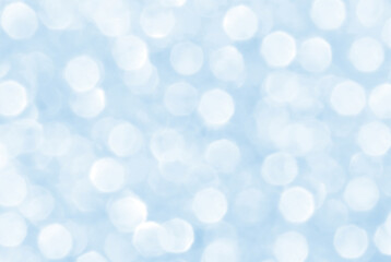 Obraz premium Abstract blue and white bokeh background. Christmas, New Year and all celebration background concepts. Snowfall in the winter.