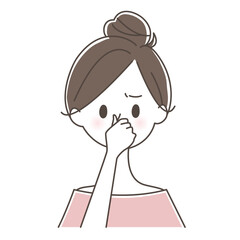 鼻をつまむ女性