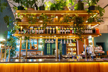 Interior of modern loft style restaurant. Bar counter