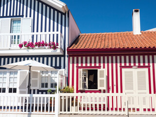 Portugal, Costa Nova. Colorful houses Palheiros striped homes