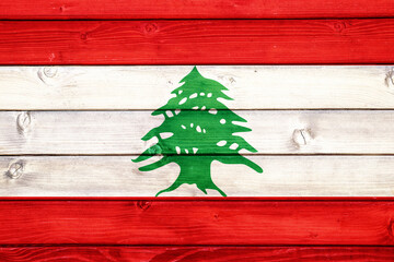 Flag of Lebanon on wooden surface