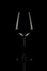 glass of wine. Set of empty crystal wine glasses, with black background and transparent tones.