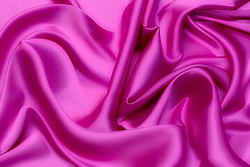 Close-up texture of natural red or pink or fuchsia fabric or cloth in same color. Fabric texture of natural cotton, silk or woo textile material. Red or pink or fuchsia fabric canvas background - obrazy, fototapety, plakaty