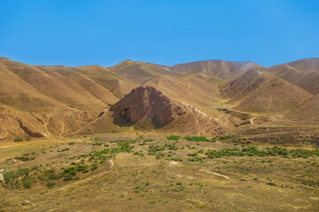 Panorama of sun-scorched hills and rocks in southern Uzbekistan, Surkhandarya region, near the border with Turkmenistan