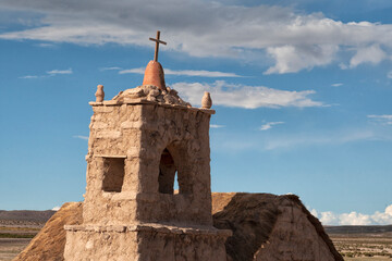 Bolivia, Altiplano, Potosi, San Juan. View of the chapel tower in the cemetery which is built of...