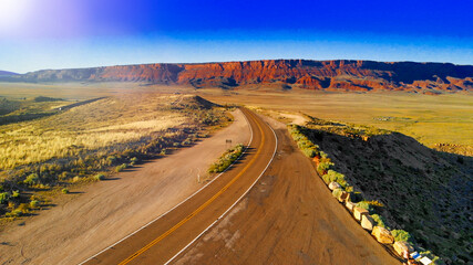 Aerial view of beautiful road corssing the canyon in summer season