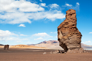 Fototapeta na wymiar Chile, Atacama Desert, Los Flamencos National Reserve. Eroded volcanic structures called the Pacana Guardians dot the landscape.