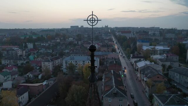 An ancient city with a tower with a spire. View from above