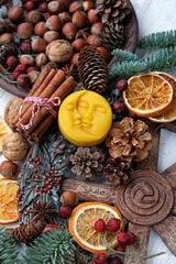 Wiccan altar for Yule sabbath, pagan holiday. Sun and moon symbol, wheel of the year, cinnamon,...