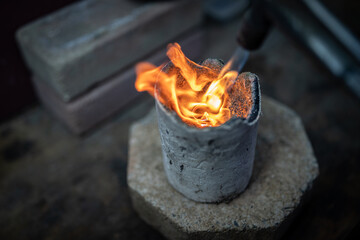 Traditional silver melting at small factory.