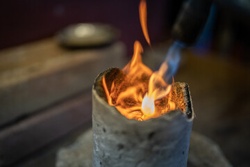 Traditional silver melting at small factory.