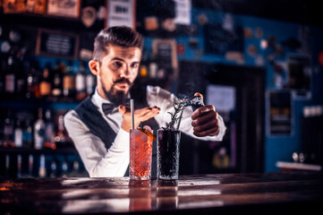 Bartender makes a cocktail in the public house