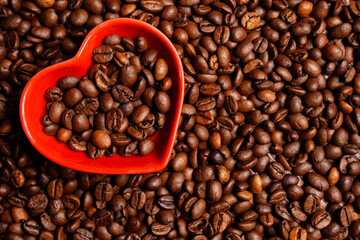 Selective focus on heart with coffee beans. Good morning coffee lover. Close up