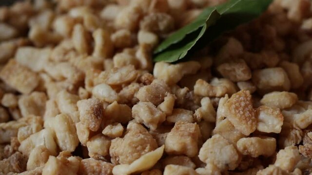 Cracklings Pork, are a specialty of cooked pork lard. This food is obtained from the rest of the adipose tissue. Cracklings or ciccioli in Italy 