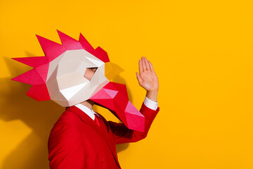 Photo of sociable unusual guy palm open mouth tell news wear rooster mask red tux isolated yellow color background © deagreez