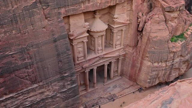View from above, stunning view of Al-Khazneh (The Treasury) one of the most elaborate temples in Petra, a city of the Nabatean Kingdom, Jordan.