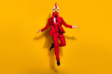 Photo of charismatic animator present best performance wear cock polygonal mask red tux isolated...