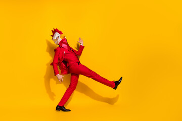 Profile photo of disco entertainer dance have fun wear rooster polygonal mask red tux isolated...